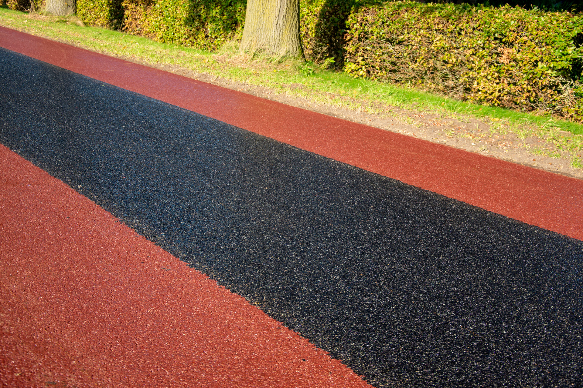 Reparatievakken-en-deklaag-rood-zwart-rood-Rouwven-Eersel